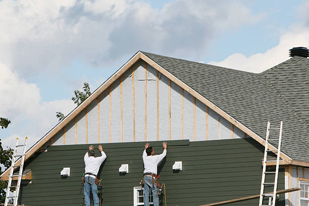 Professional Siding Repair technician working in Delmont, PA